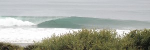 img_7284 Another sick left coming in down the way... Its hard to tell how big it is but if you made the drop on this one you would be standing in the barrel with room to spare!