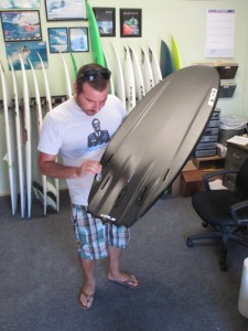 img_78931 Robo inspecting the fin setup on the new 5`9!