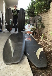 IMG_9017 Christian holding the standard three fin 5`0 BD3 and the new single fin 5`0 with the 10`0 CJ and the 9`7 Velzy in the foreground...